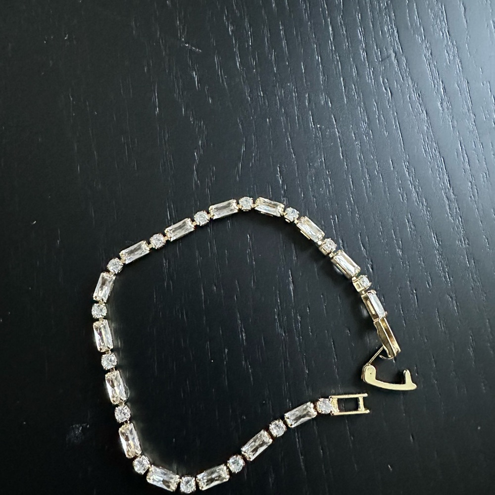 Gold tone tennis bracelet for women with cubic zirconia